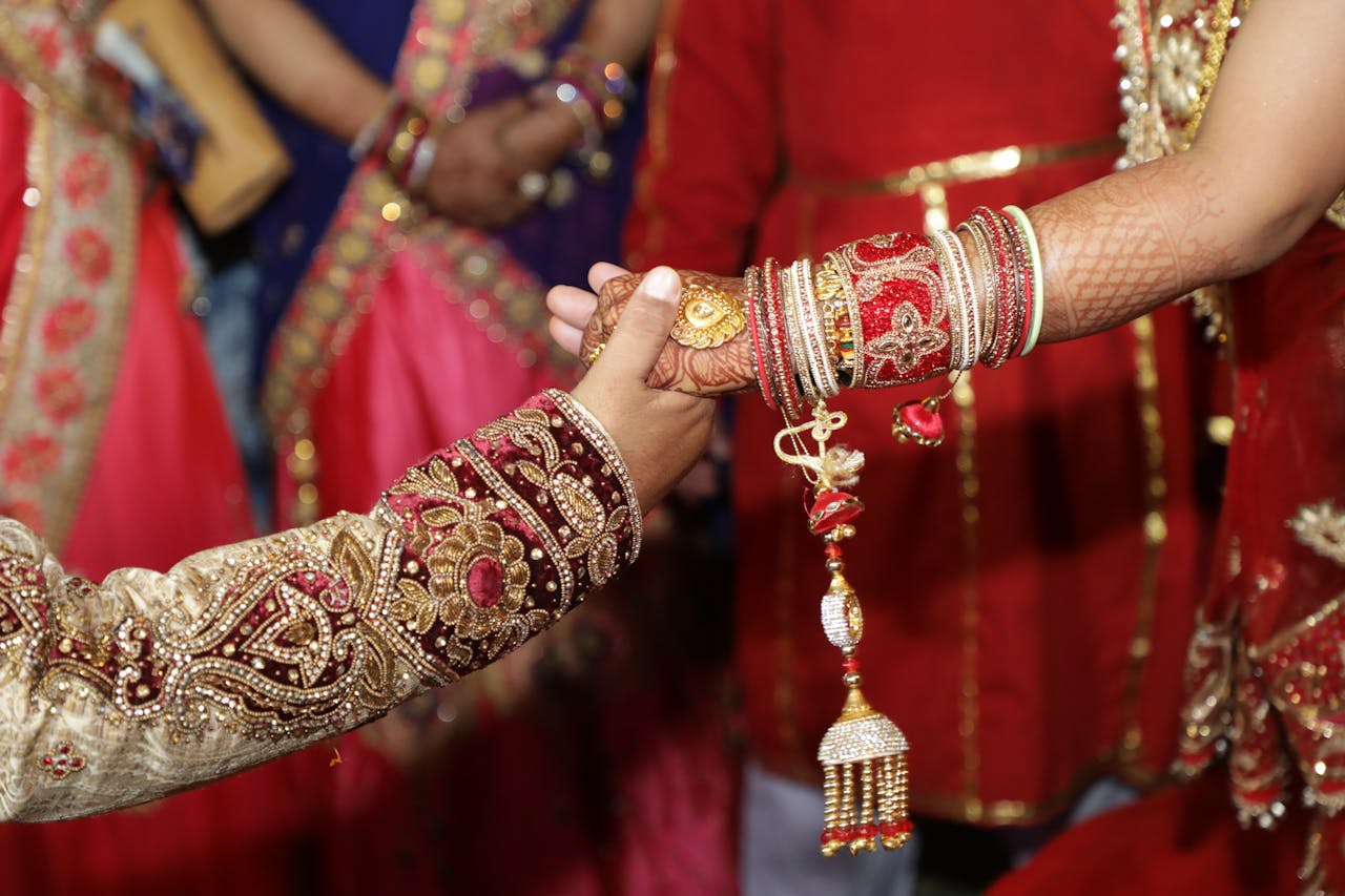 Close-up of a vibrant Indian wedding ceremony showcasing traditional attire and jewelry in Jaipur.